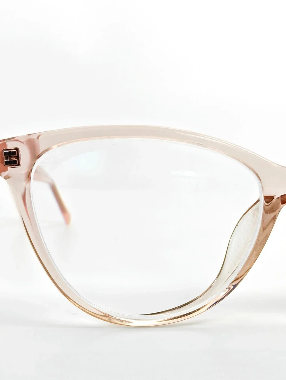 Sing. Subtle Pink Transparent Front Matte Temple Cat-Eye Frame.